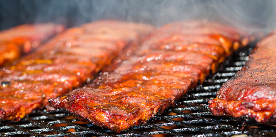 Racks of ribs on a competition smoker